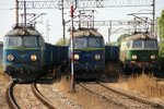 Es warten auf die Weiterfahrt die 3 150 596-7 links, Mitte ET22-1163, ganz rechts die ET22-909 in Deblin Polen, am 8.9.16.